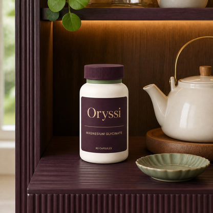 Oryssi magnesium glycinate bottle at a tea station